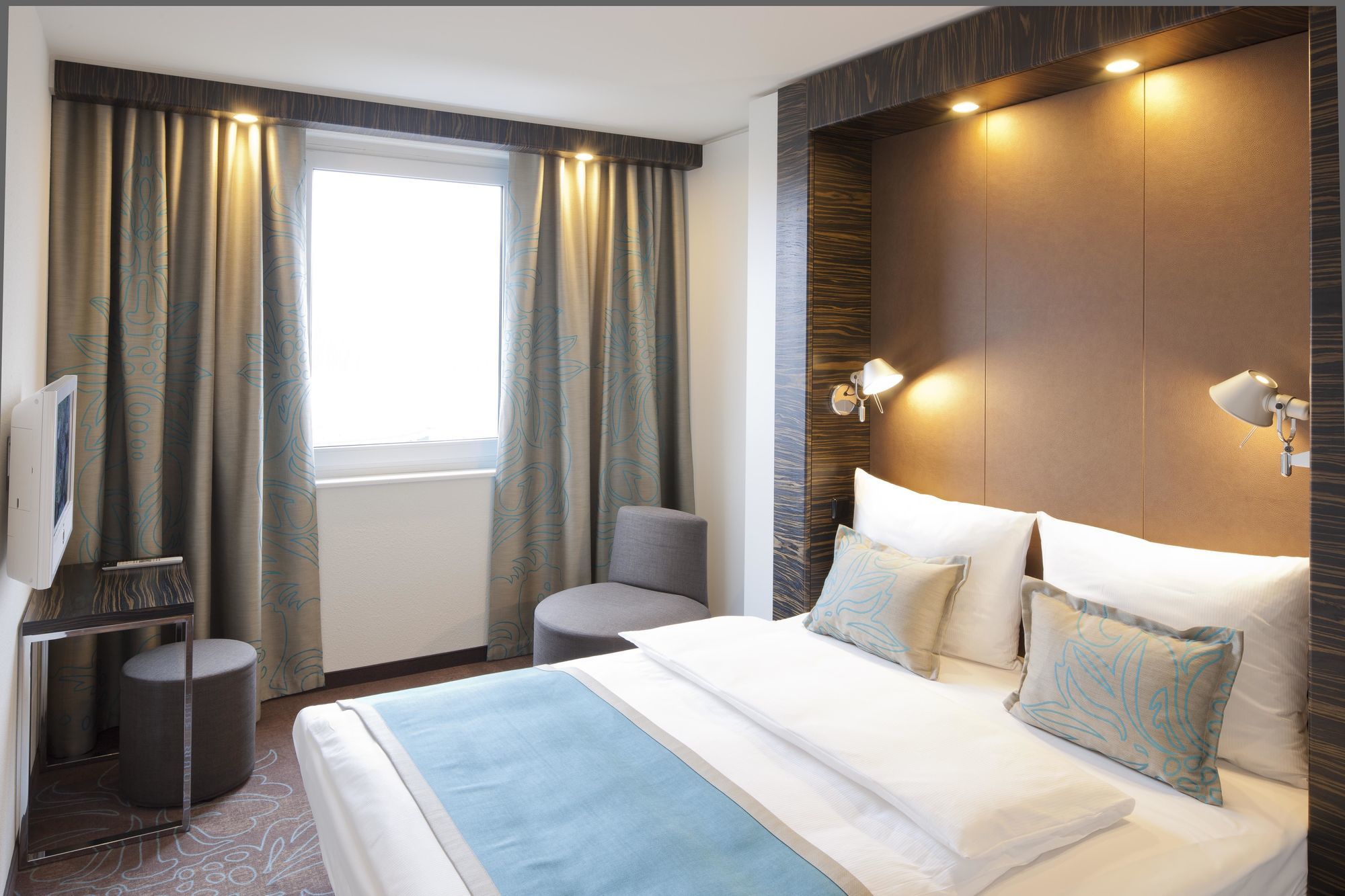 Motel One Saarbrücken Rom bilde