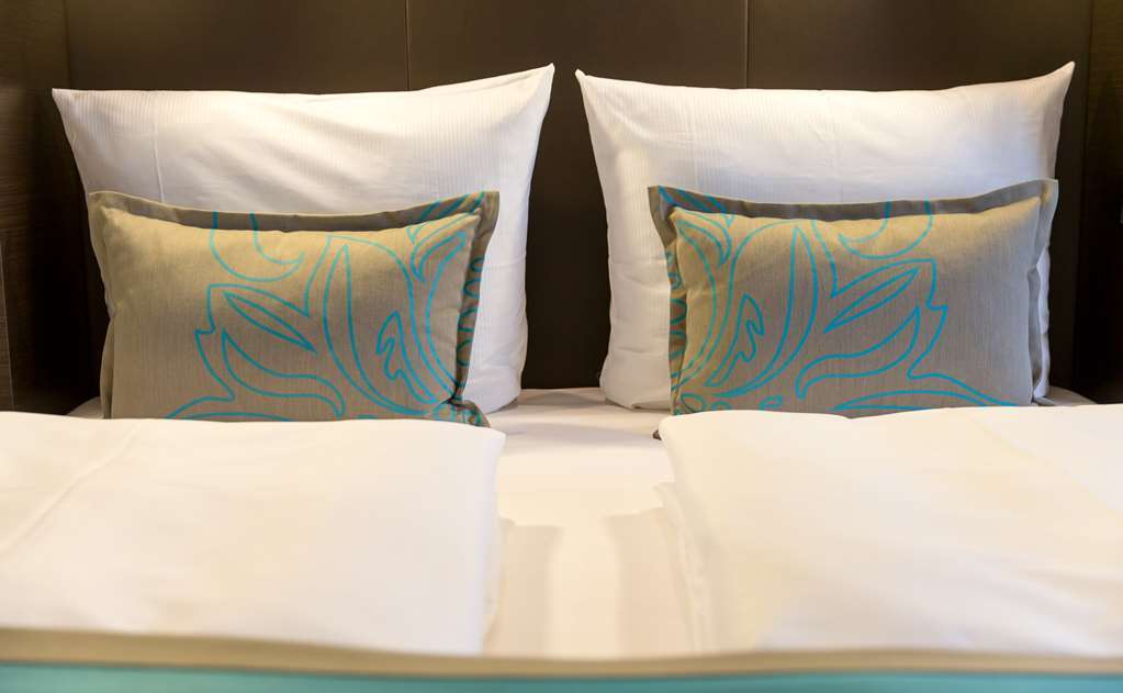 Motel One Saarbrücken Rom bilde